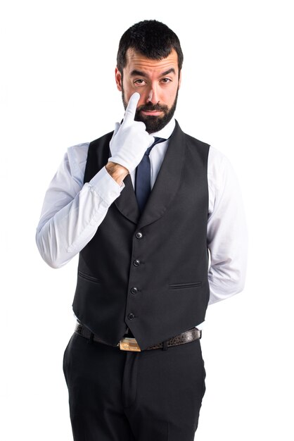 Luxury waiter showing something