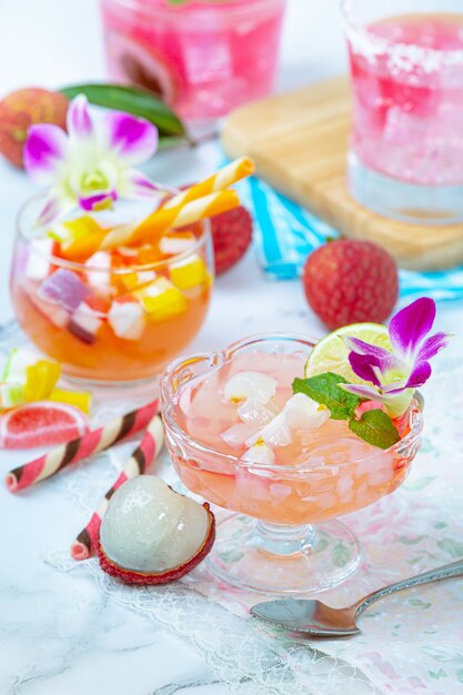 Lychee jelly, seasonal fruit and beautifully decorated Thai dessert concept.