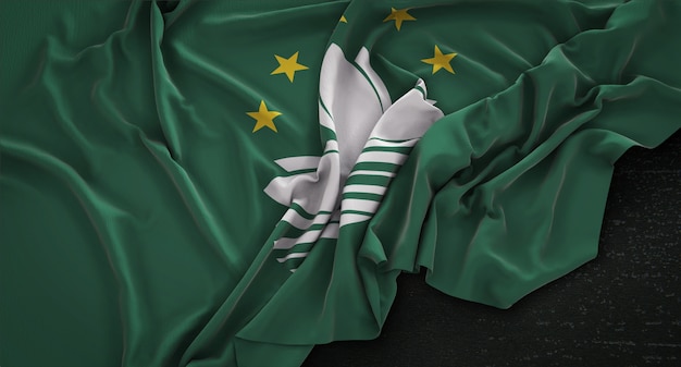 Free photo macau flag wrinkled on dark background 3d render