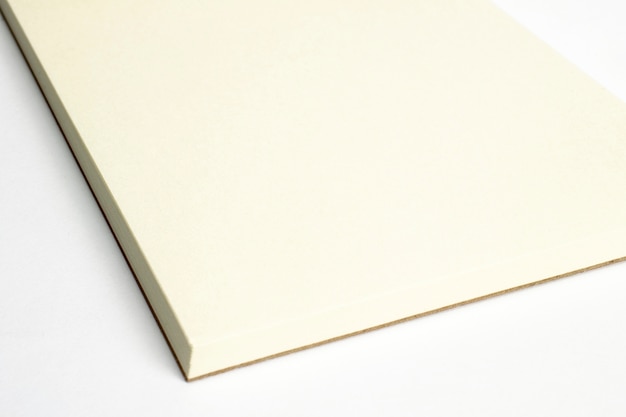 Free Photo macro of blank opened notebook corner with cardboard hardcover isolated