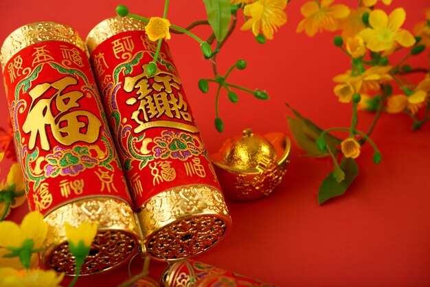 Macro shot of Tet decorations against red background