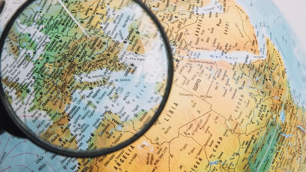 Magnifying glass over Europe on globe