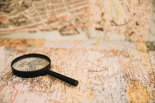 Magnifying glass on old map