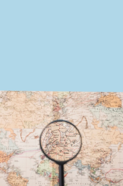 Free Photo magnifying glass on world map