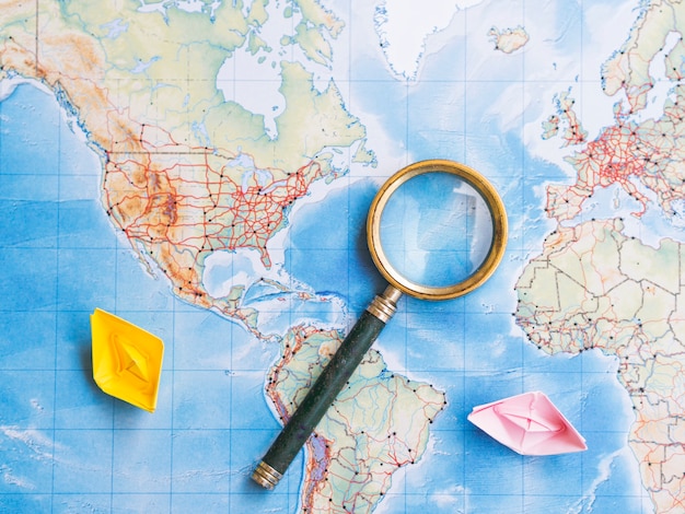 Free Photo magnifying glass on world map