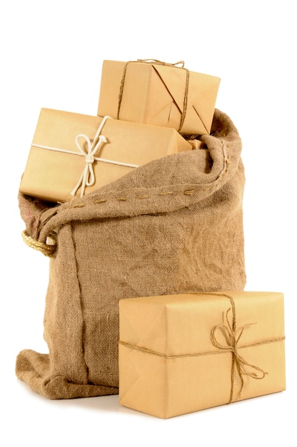 Free photo mail bag filled with brown paper parcels