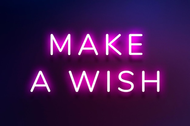 Free photo make a wish neon pink text on indigo blue background