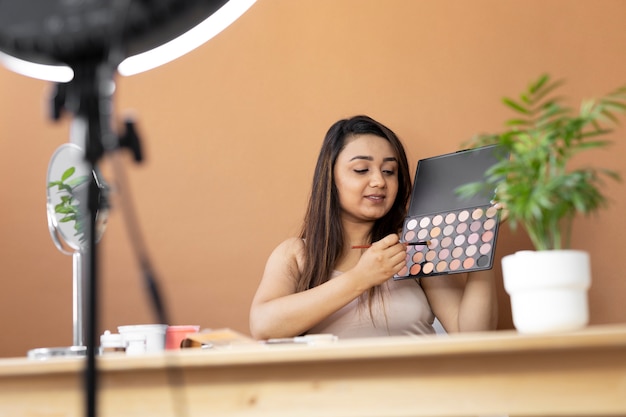 Free Photo makeup artist vlogging her tutorials