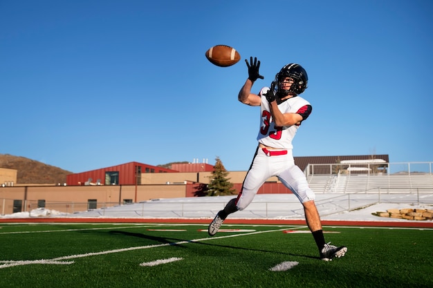 Male american football player in uniform on the field