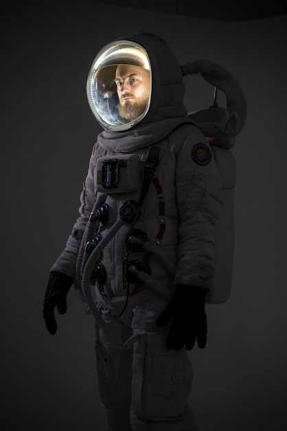 Free photo male astronaut fully equipped with spacesuit and helmet