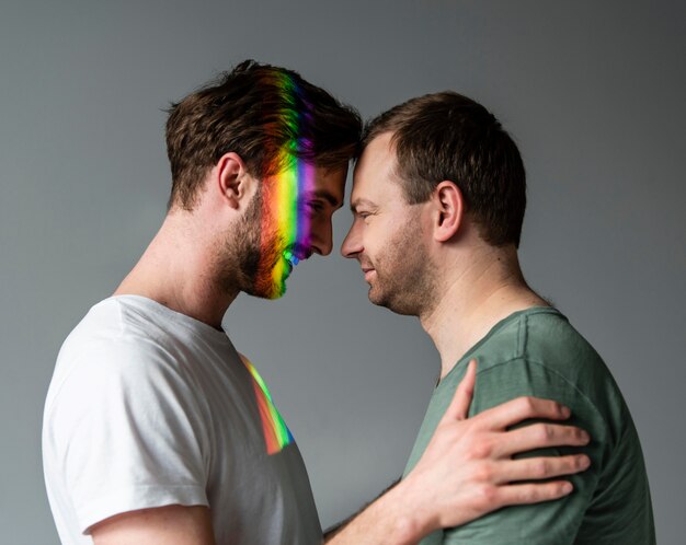 Male couple with rainbow symbol