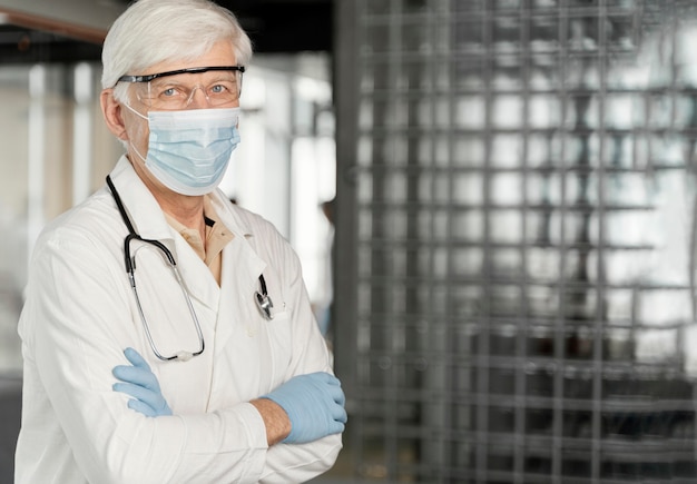 Male doctor portrait with medical mask