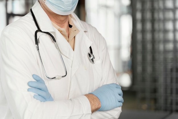 Male doctor portrait with medical mask