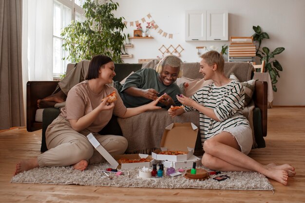 Male and female friends getting a manicure together