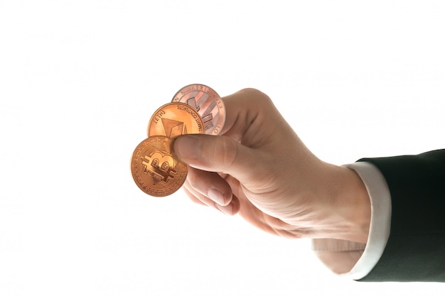 Male hand with golden bitcoin on white background