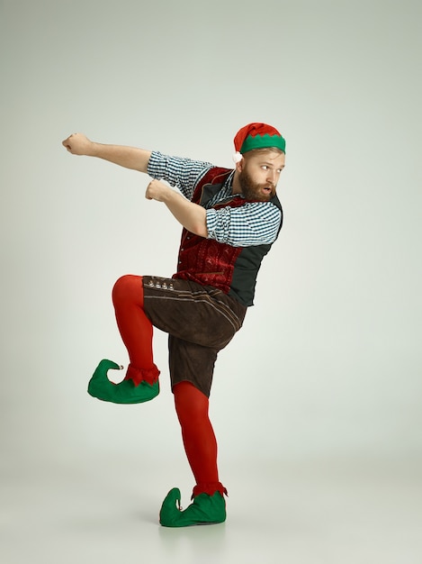 Male person with an elf costume.