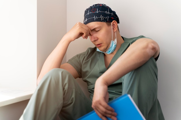 Free photo male student practicing medicine