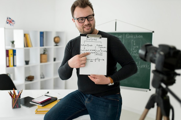 Free Photo male teacher doing an english lesson online for his students