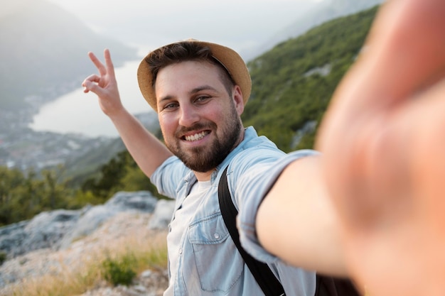 Free Photo male traveler in montenegro outdoors