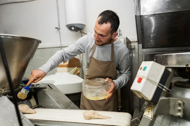 Man baking a fresh bread