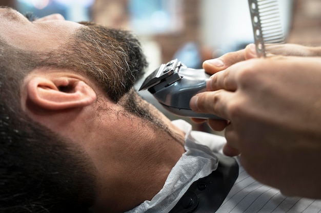 Man at barber shop close up