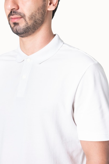 Free photo man in basic white polo shirt apparel studio shoot