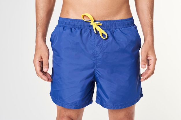 Man in blue board shorts