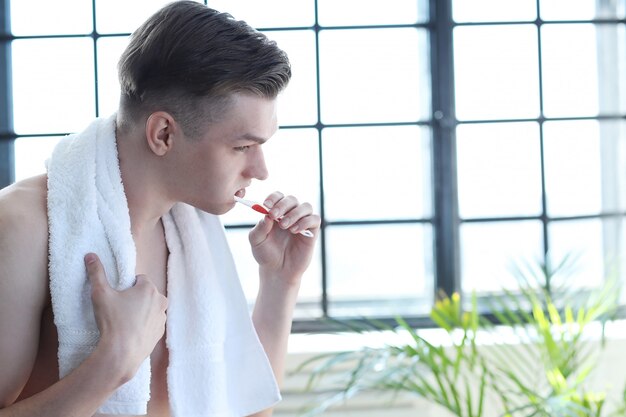 Man brushing teeth