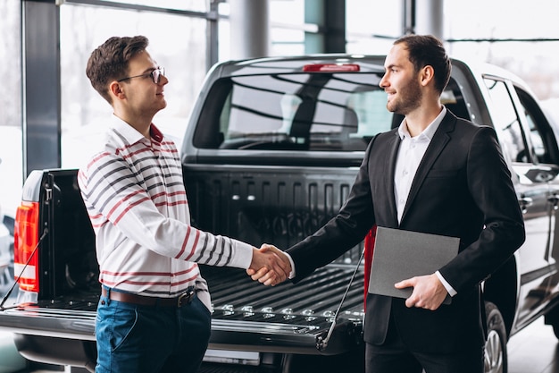 Free Photo man buying a car