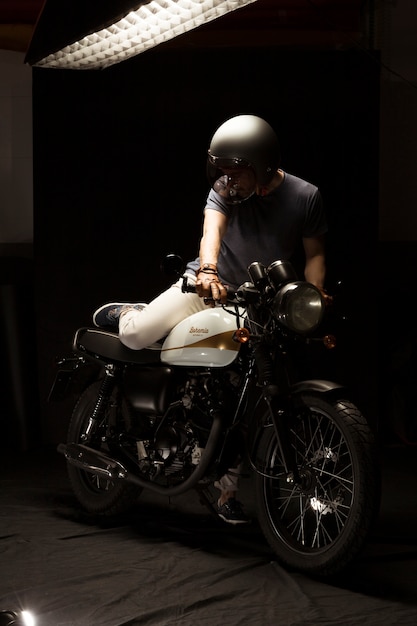 Free photo man on cafe racer style motorbike