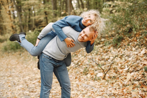 Man carrying woman piggyback