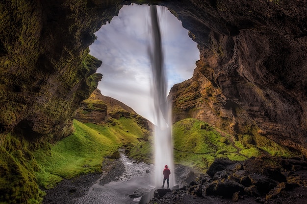 Free Photo man in a cave in rainforest