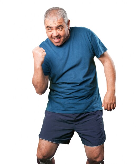 Man celebrating with a raised fist