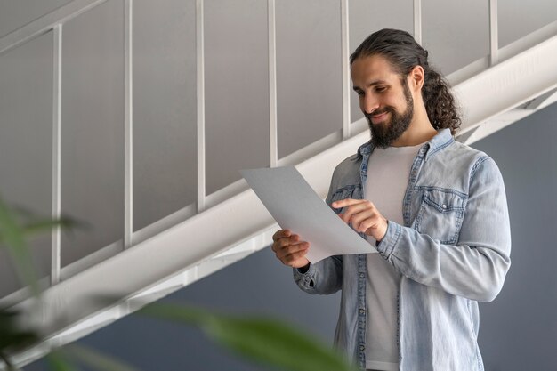 Man checking some notes at work