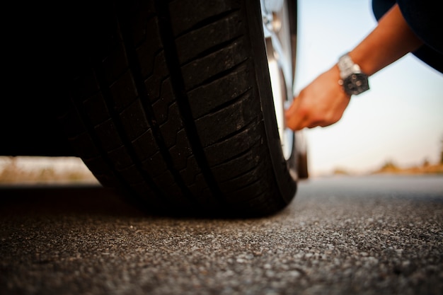 Man checking the wheel