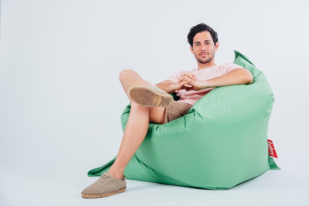 Free photo man chilling on couch