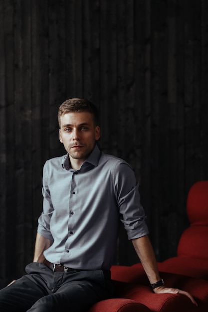 Man in classic grey shirt and trousers