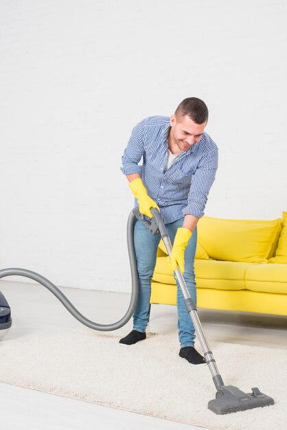 Man cleaning his home