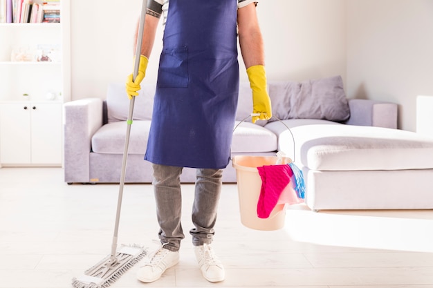 Man cleaning his home