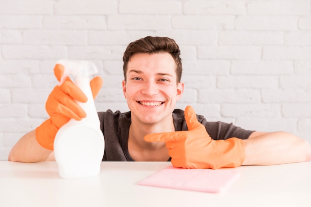 Man cleaning his home