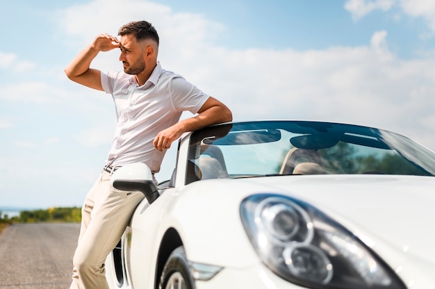 Man covering eyes from sun