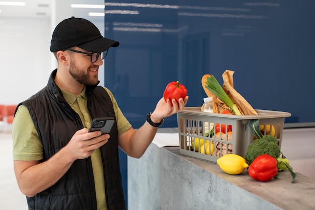 Free Photo man delivering groceries to customers