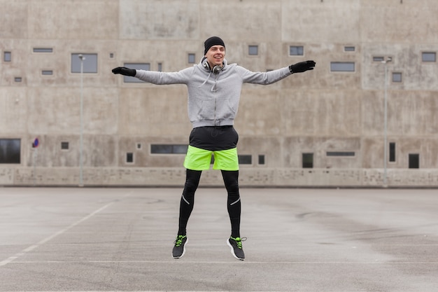 Free photo man doing balance exercise