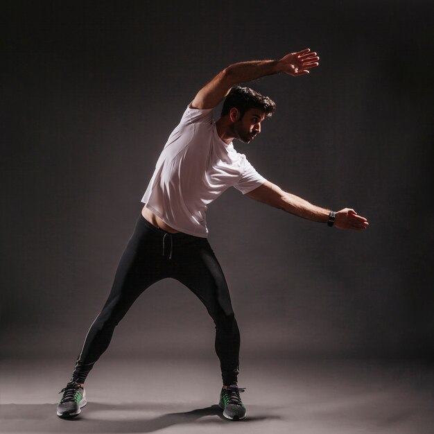 Man doing bending exercises