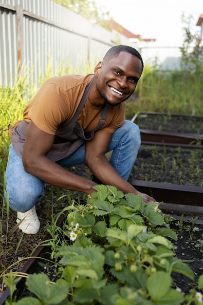 Man doing indoor farming