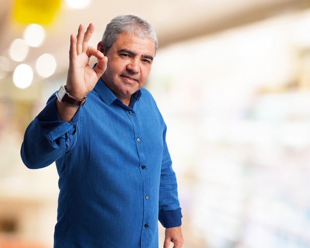 Man doing ok gesture