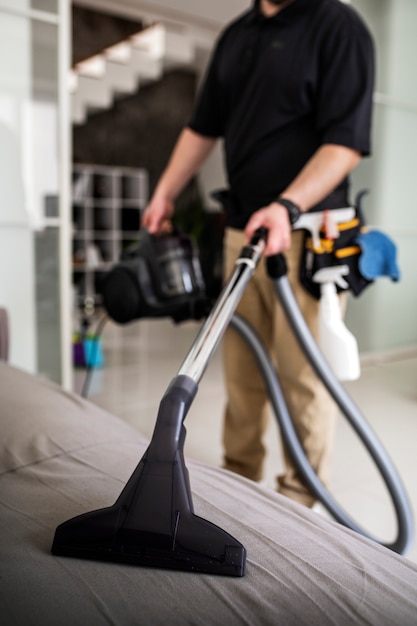 Man doing professional home cleaning service