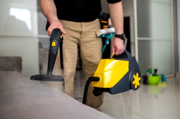 Man doing professional home cleaning service