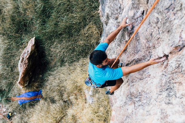 Man doing rope climbing