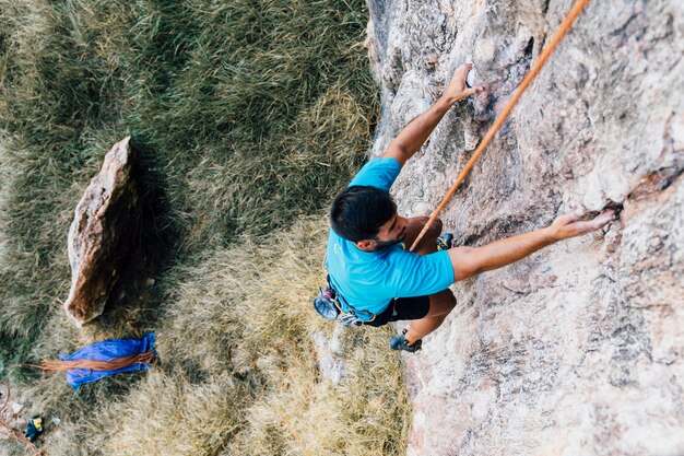 Man doing rope climbing